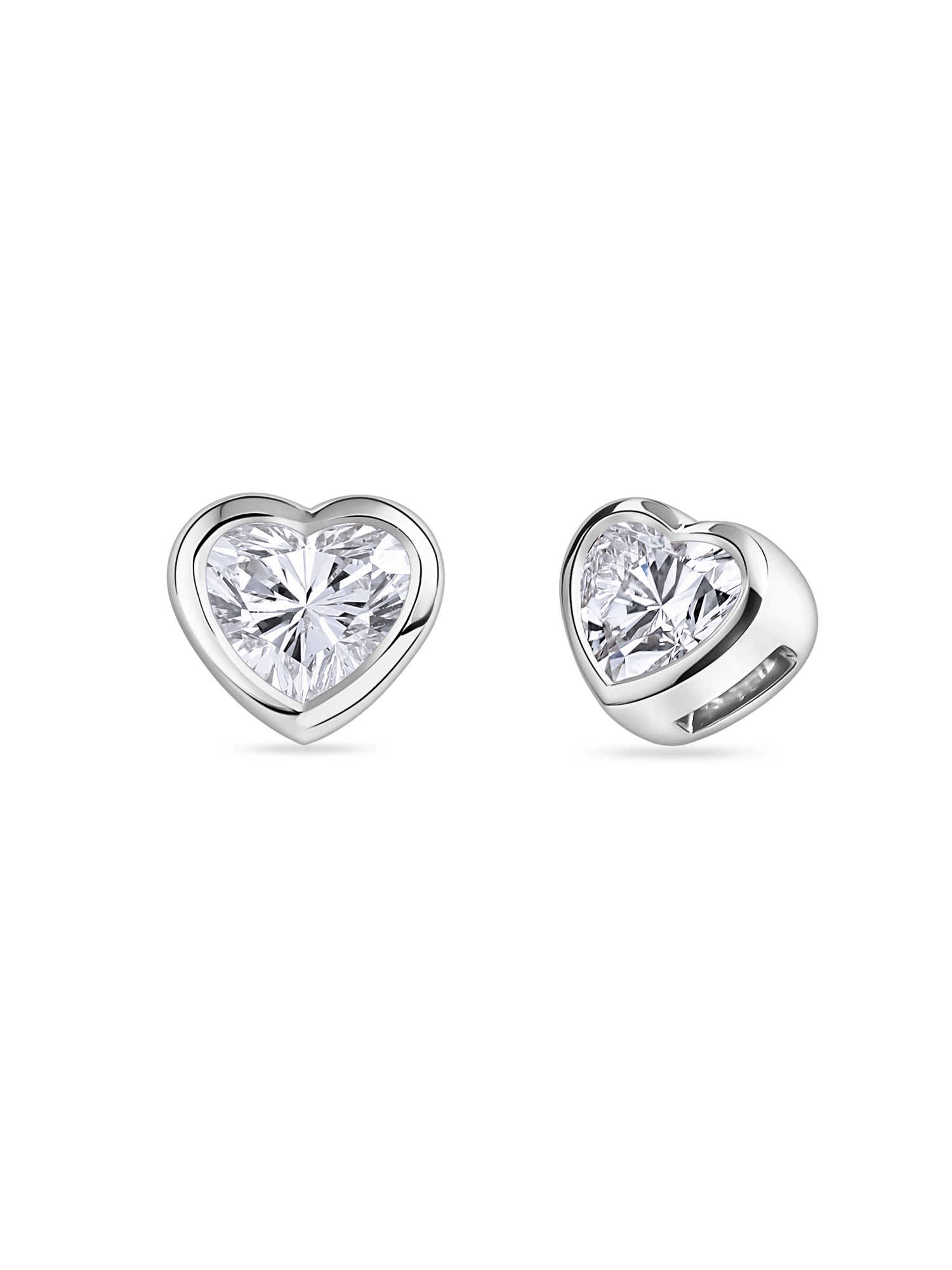 Heart-shaped diamond earrings in platinum. Made in London with lab grown dimaonds