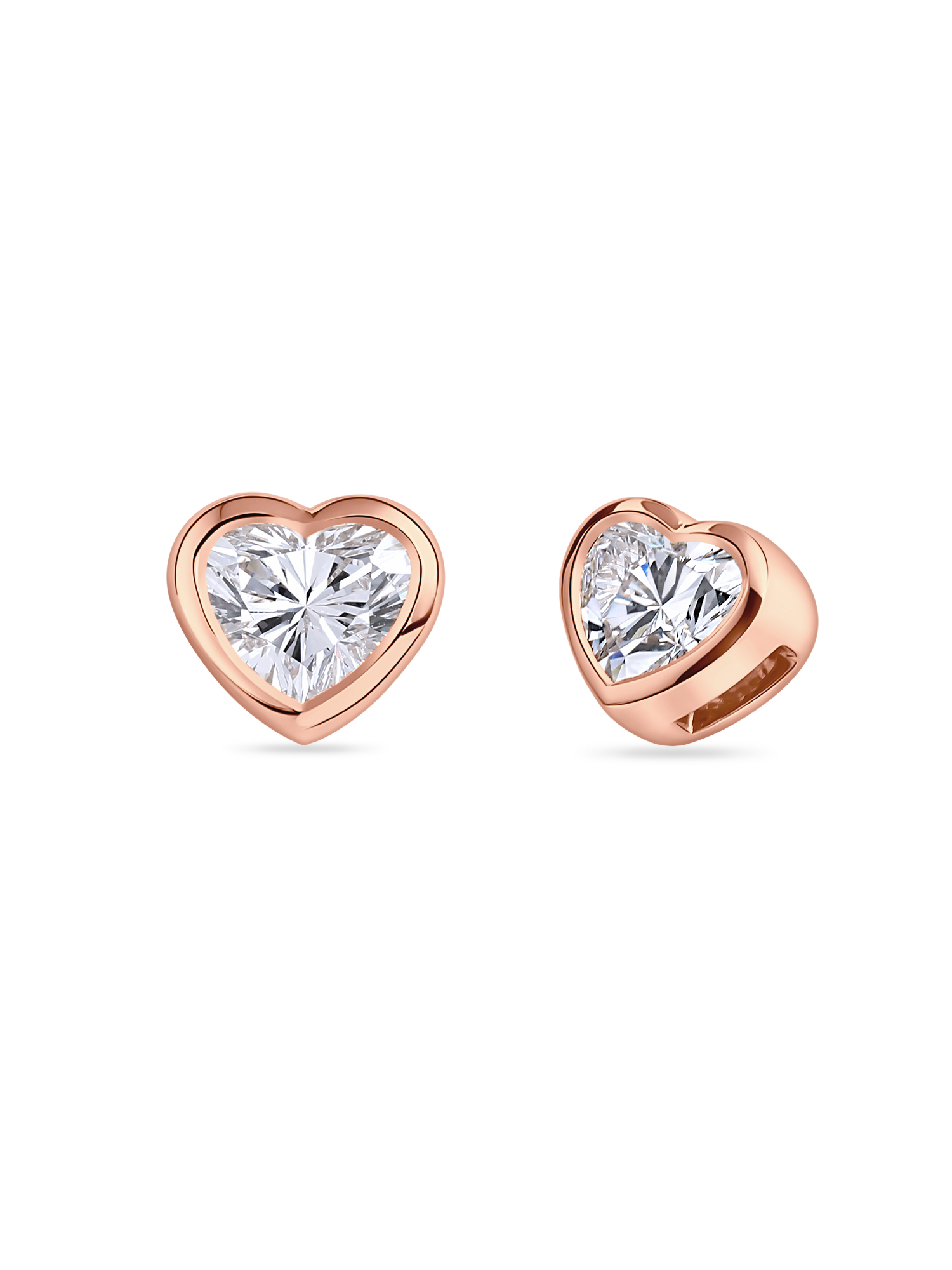 Heart-shaped diamond earrings in rose gold. Made in London with lab grown dimaonds