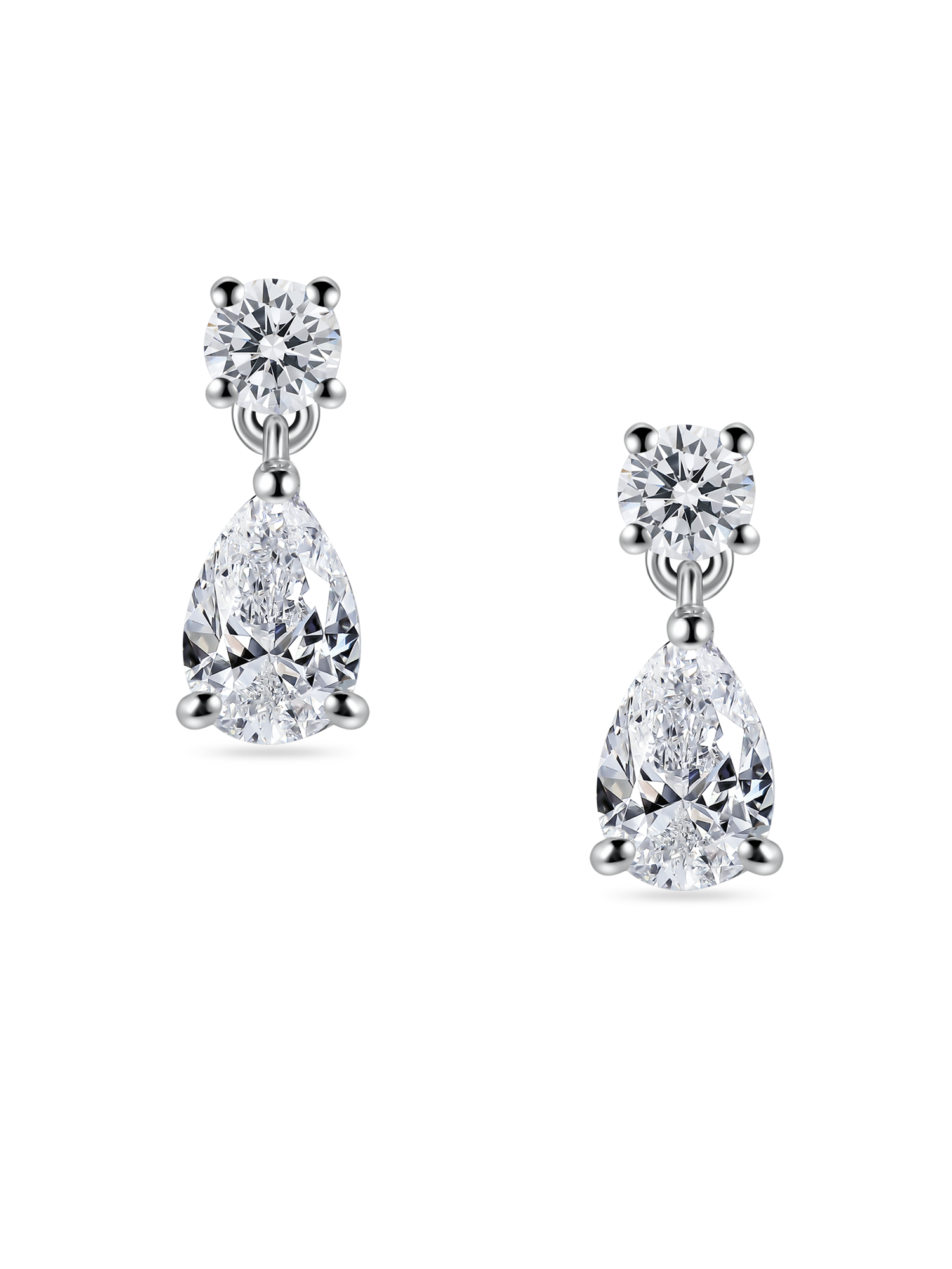 close up of lab grown diamond drop earrings. Round and pear diamond earrings in platinum, on model. 2 carats total weight