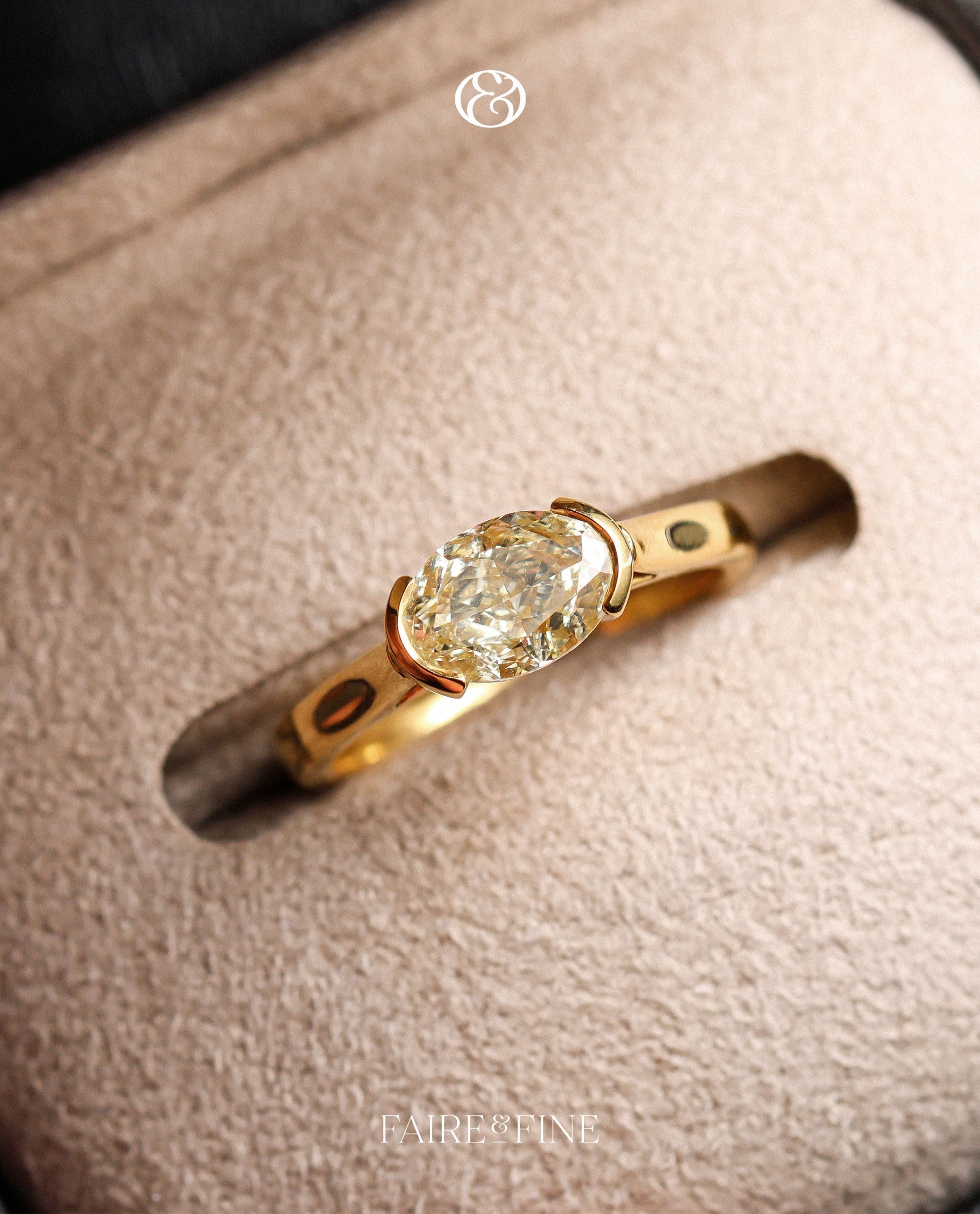 east-west yellow lab grown diamond solitaire engagement ring