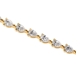 7ct lab grown pear diamond tennis bracelet in 18k gold without background