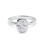 front view of platinum bezel set elongated cushion cut engagement ring. Handmade in london with recycled precious metals and lab grown diamonds. 