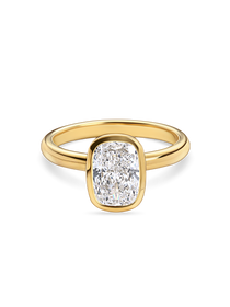 front view of yellow gold bezel set elongated cushion cut engagement ring. Handmade in london with recycled precious metals and lab grown diamonds. 
