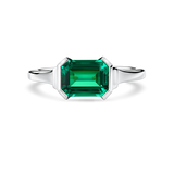 Front view of lab-grown emerald ring in east west setting with platinum band