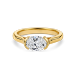 no background of the front view of east west oval, lab grown diamond and yellow gold hand finished in London, uk