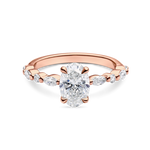 front view of unique rose gold engagement ring featuring lab grown diamonds and a diamond set band. Made in london, uk