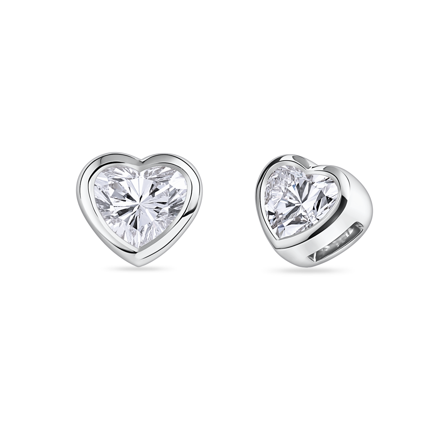 Heart-shaped diamond earrings in platinum. Made in London with lab grown dimaonds