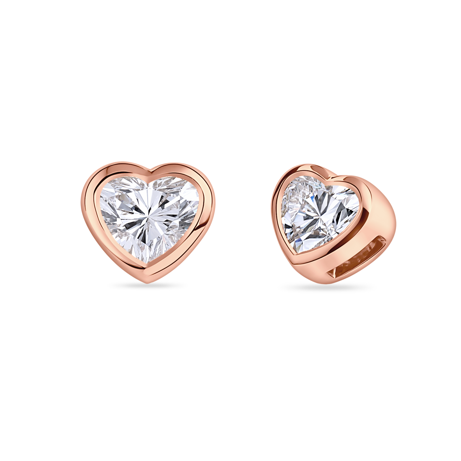 Heart-shaped diamond earrings in rose gold. Made in London with lab grown dimaonds