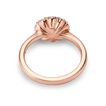 setting view of rose gold vintage inspired daisy engagement ring. Made with lab grown diamonds by independent jewellers in london uk