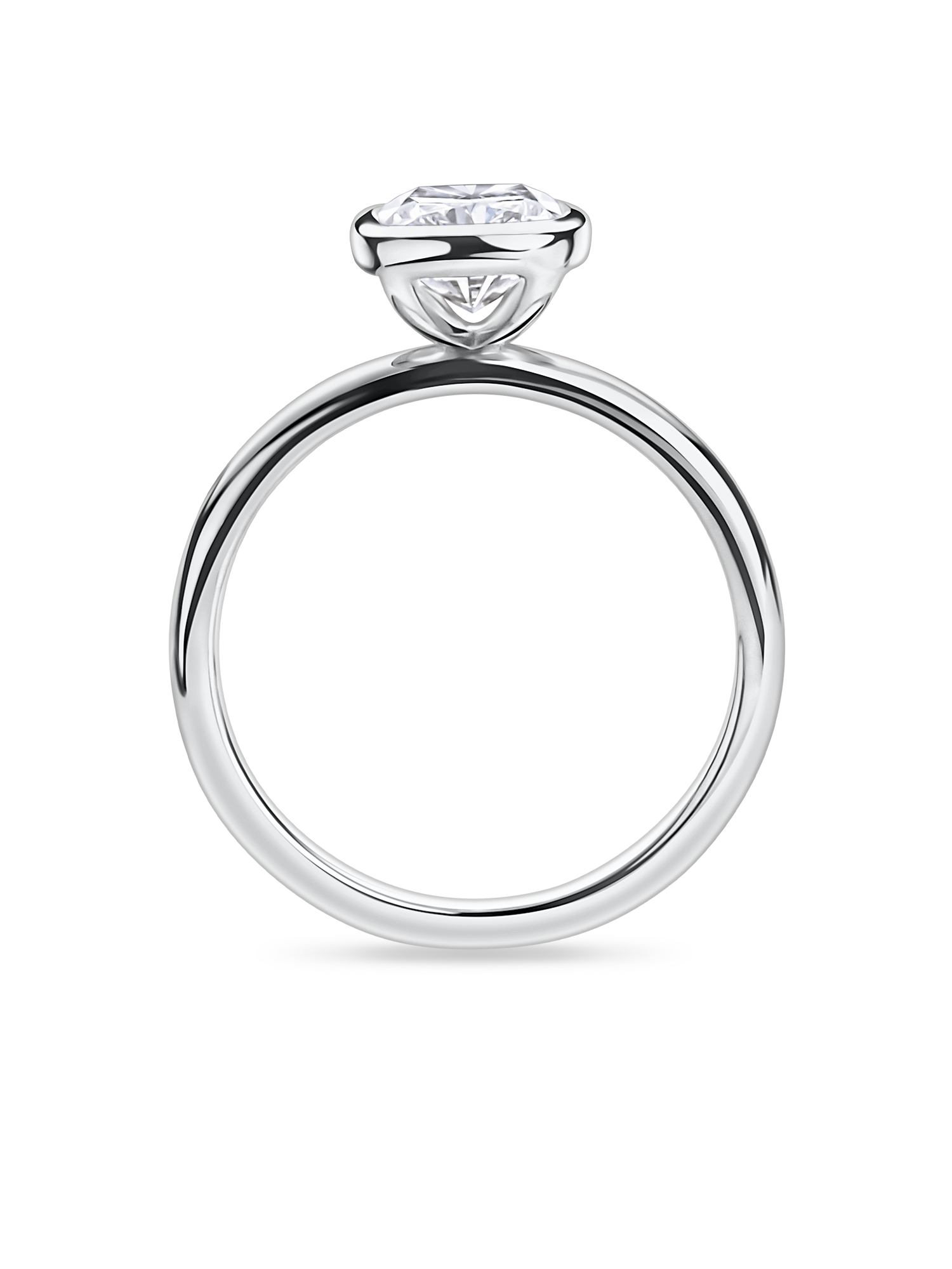side view of platinum bezel set elongated cushion cut engagement ring. Handmade in london with recycled precious metals and lab grown diamonds. 