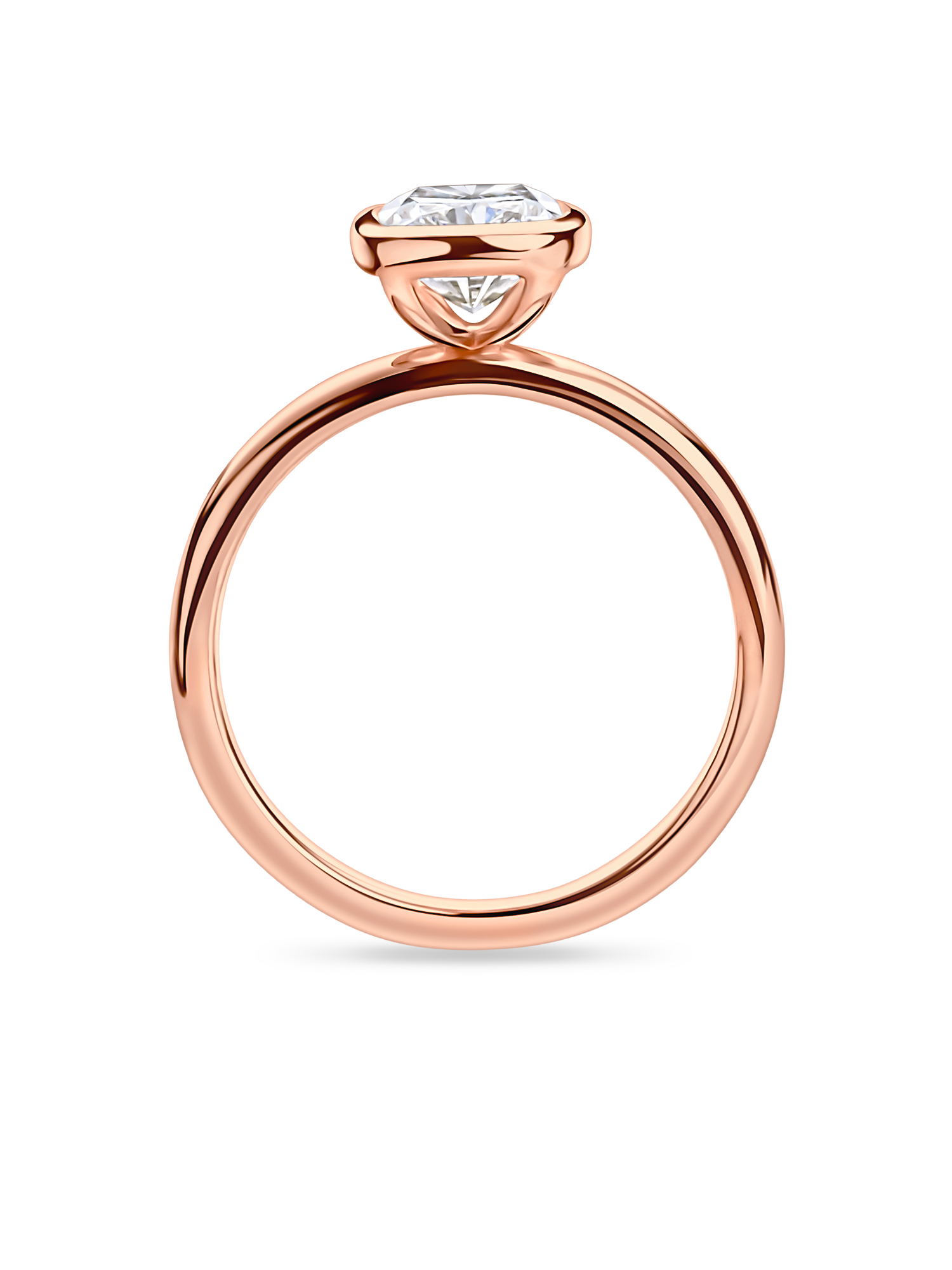 side view of rose gold bezel set elongated cushion cut engagement ring. Handmade in london with recycled precious metals and lab grown diamonds. 