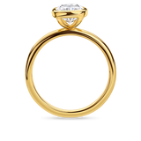side view of yellow gold bezel set elongated cushion cut engagement ring. Handmade in london with recycled precious metals and lab grown diamonds. 