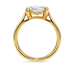 no background of the side view of east west oval, lab grown diamond and yellow gold hand finished in London, uk