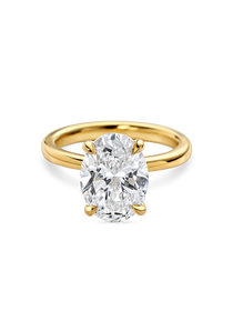 front view of Oval solitaire engagement ring with lab grown diamond in recycled yellow gold. 3 carat oval diamond