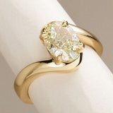 Custom lab grown diamond engagement ring in yellow gold, featuring a yellow oval. Handmade in Hatton Garden, London, UK