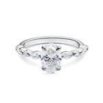 front view of unique yellow gold engagement ring featuring lab grown diamonds and a diamond set band. Made in london, uk