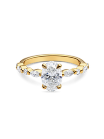 front view of unique yellow gold engagement ring featuring lab grown diamonds and a diamond set band. Made in london, uk