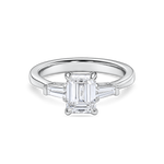 front view of emerald cut trilogy engagement ring in platinum. features lab grown diamond