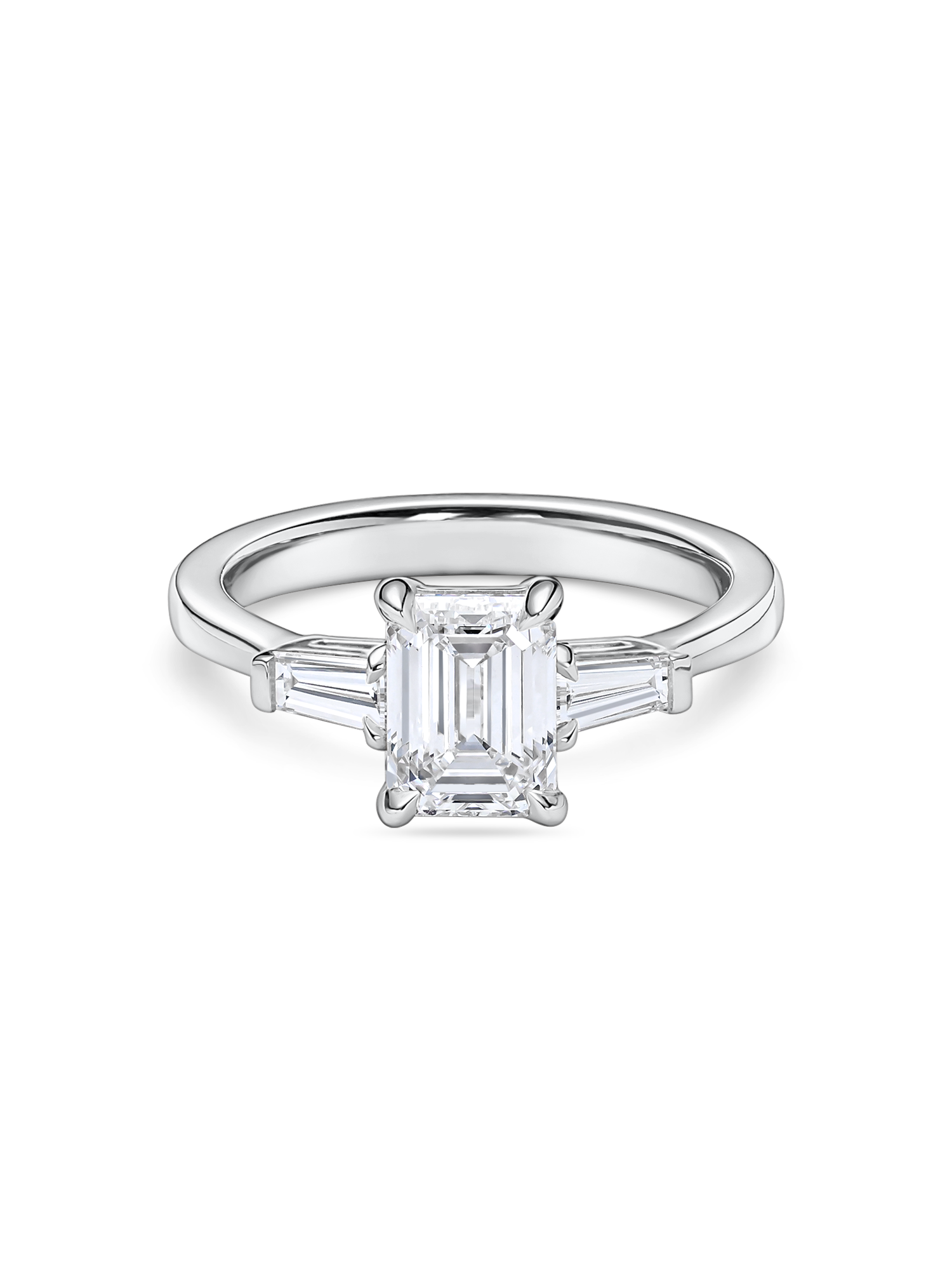 front view of emerald cut trilogy engagement ring in platinum. features lab grown diamond