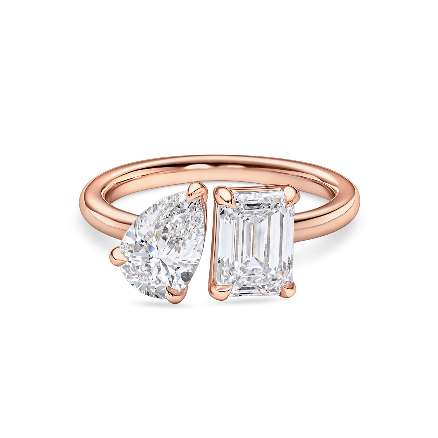 front view of a 2 carat toi et moi ring. Lab Grown pear and emerald cut diamonds in rose gold