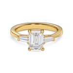 emerald cut trilogy engagement ring in yellow gold side view. features 2 carat lab grown diamond