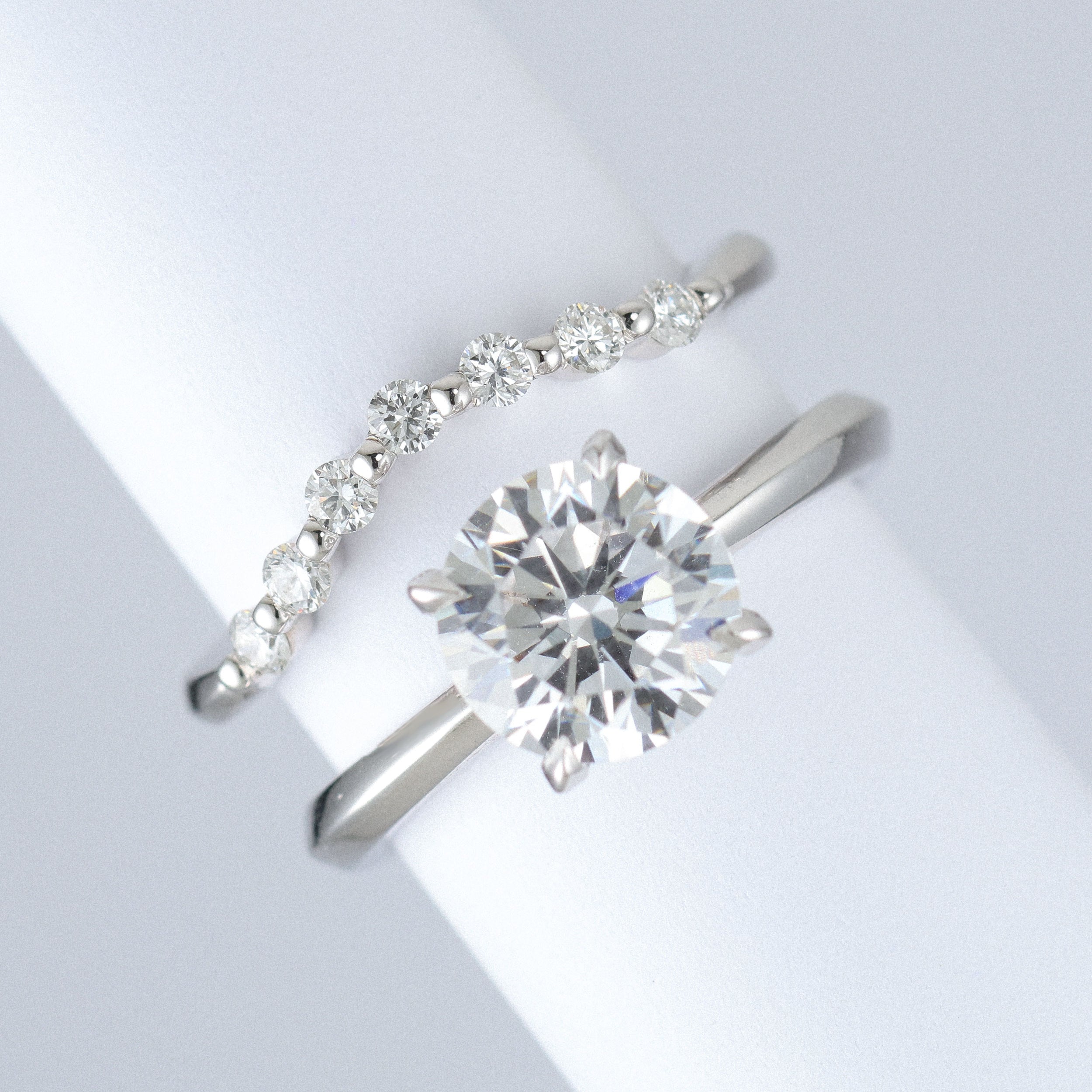 shaped wedding band with 2mm lab grown diamonds in platinum with engagement ring