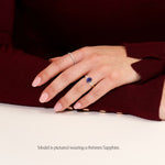 lab grown gemstone engagement ring yellow gold on model hand
