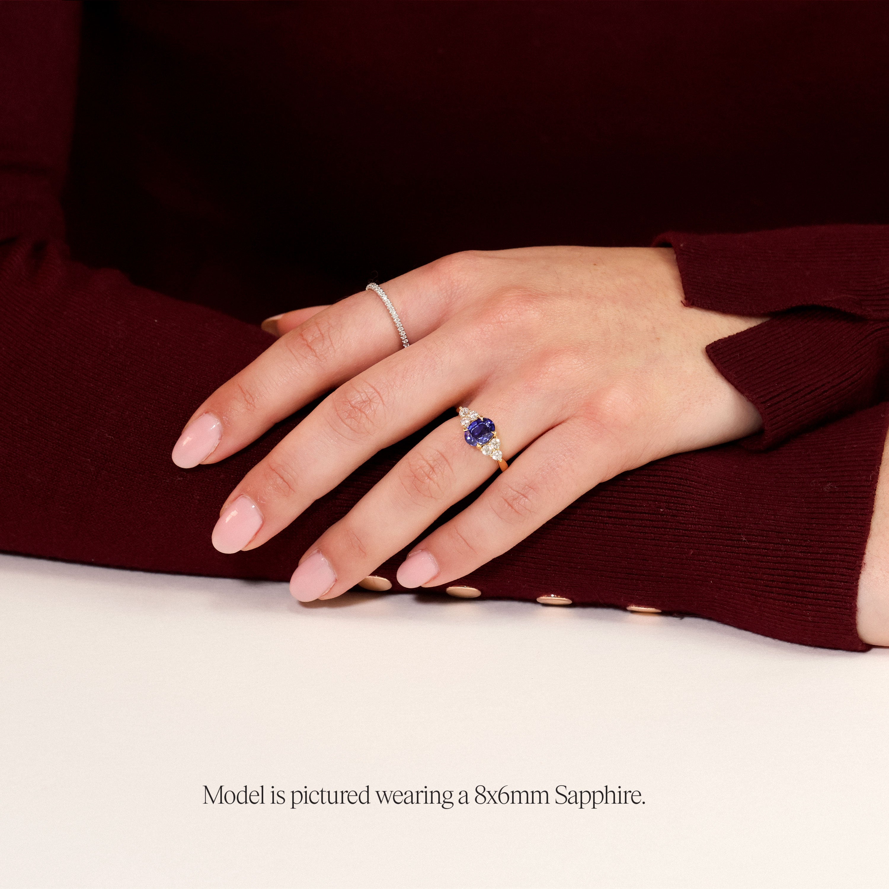 lab grown gemstone engagement ring yellow gold on model hand
