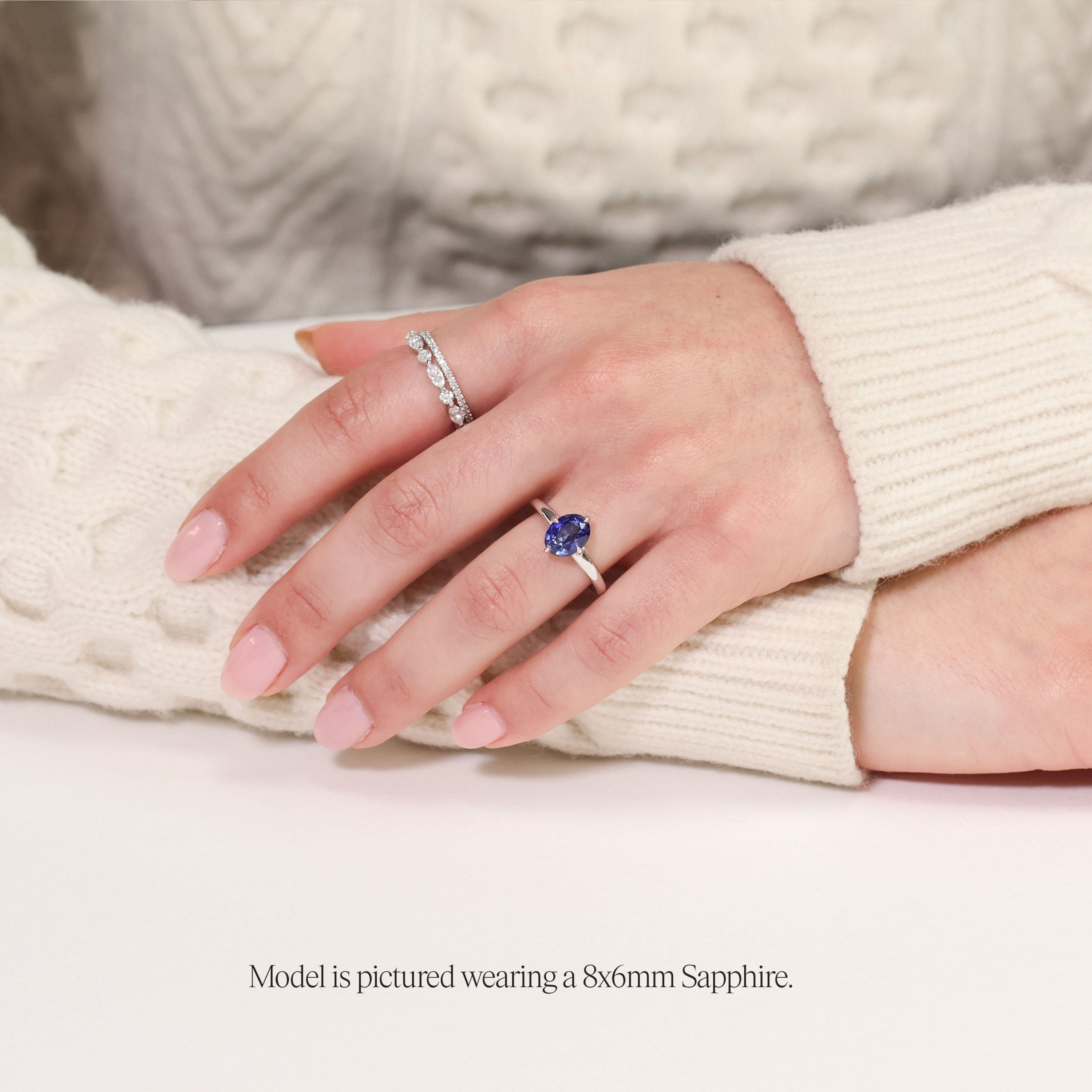 Lab grown gemstone in platinum on hand