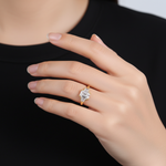 model wearing Five Stone Art Deco Emerald Cut Engagement Ring in yellow gold. Lab grown emerald cut diamond and baguettes. Handmade in london uk 