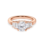 front view of rose gold art deco engagement ring. Five stone ring with round lab grown diamonds and side baguettes
