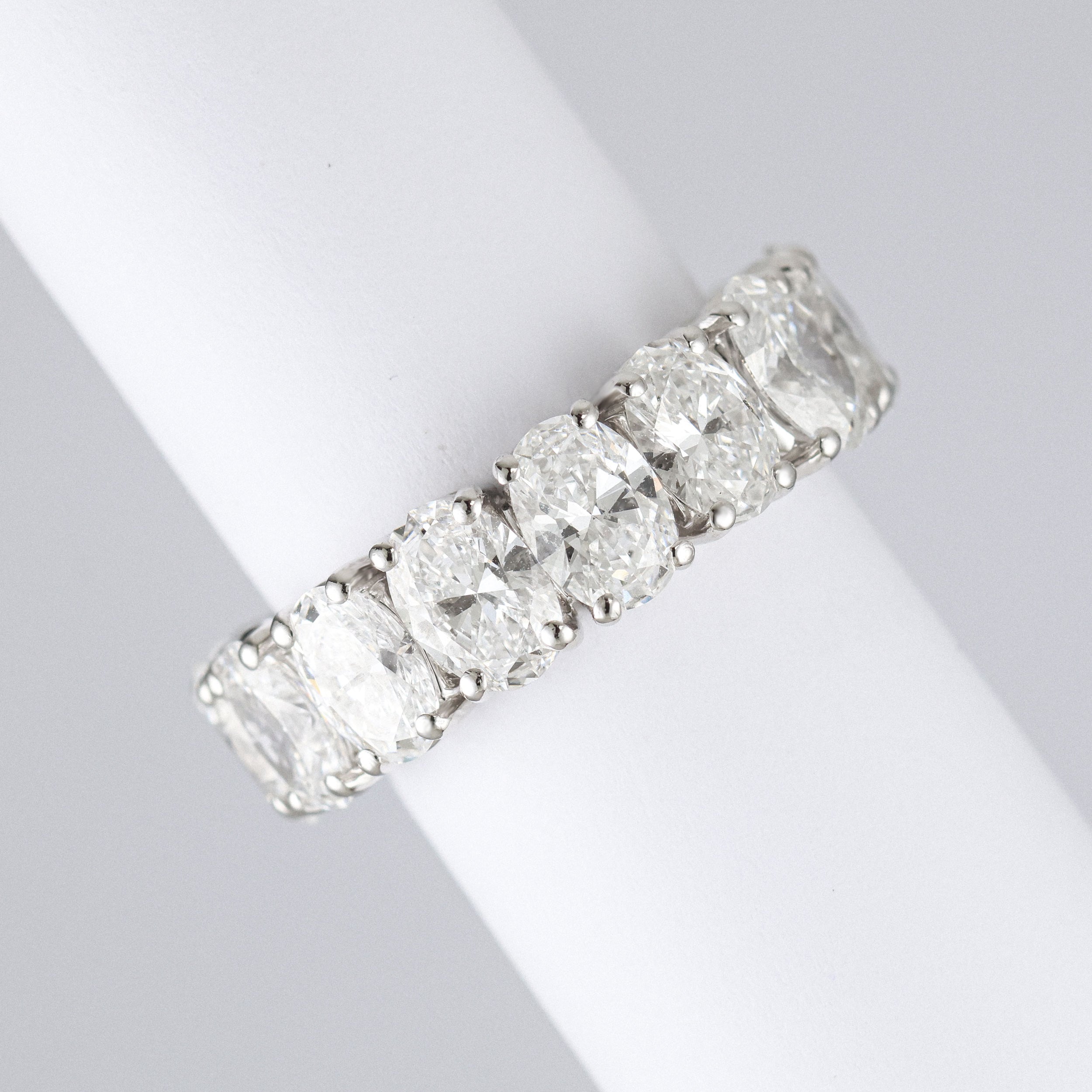 oval diamond eternity band in platinum. Fully set with lab grown diamonds and recycled precious metals.