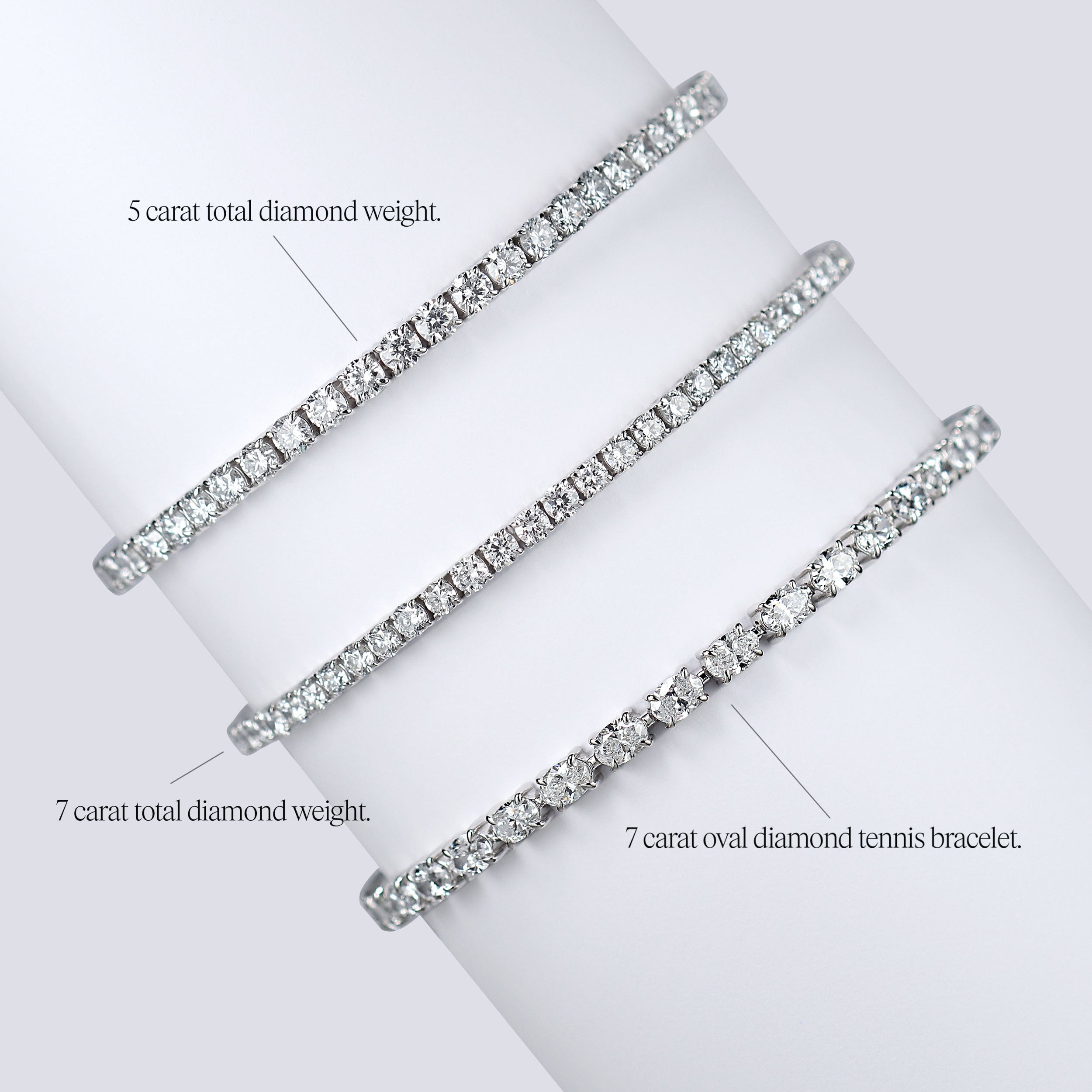 oval tennis bracelet next to two rounds. lab grown diamonds in platinum