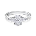 Front view of platinum oval engagement ring. Lab grown trilogy with side pears