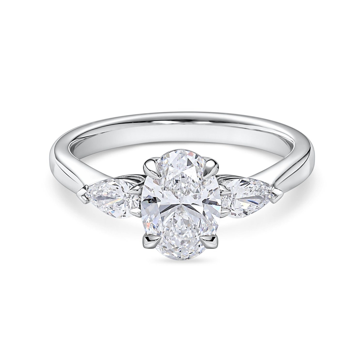 Front view of platinum oval engagement ring. Lab grown trilogy with side pears
