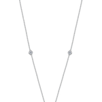 zoomed out view of the spectacle set 5 round lab grown diamond necklace. Made with recycled precious metals in london.