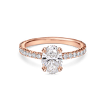 front view of rose gold oval solitaire engagement ring with hidden halo and diamond set band. all lab grown diamonds