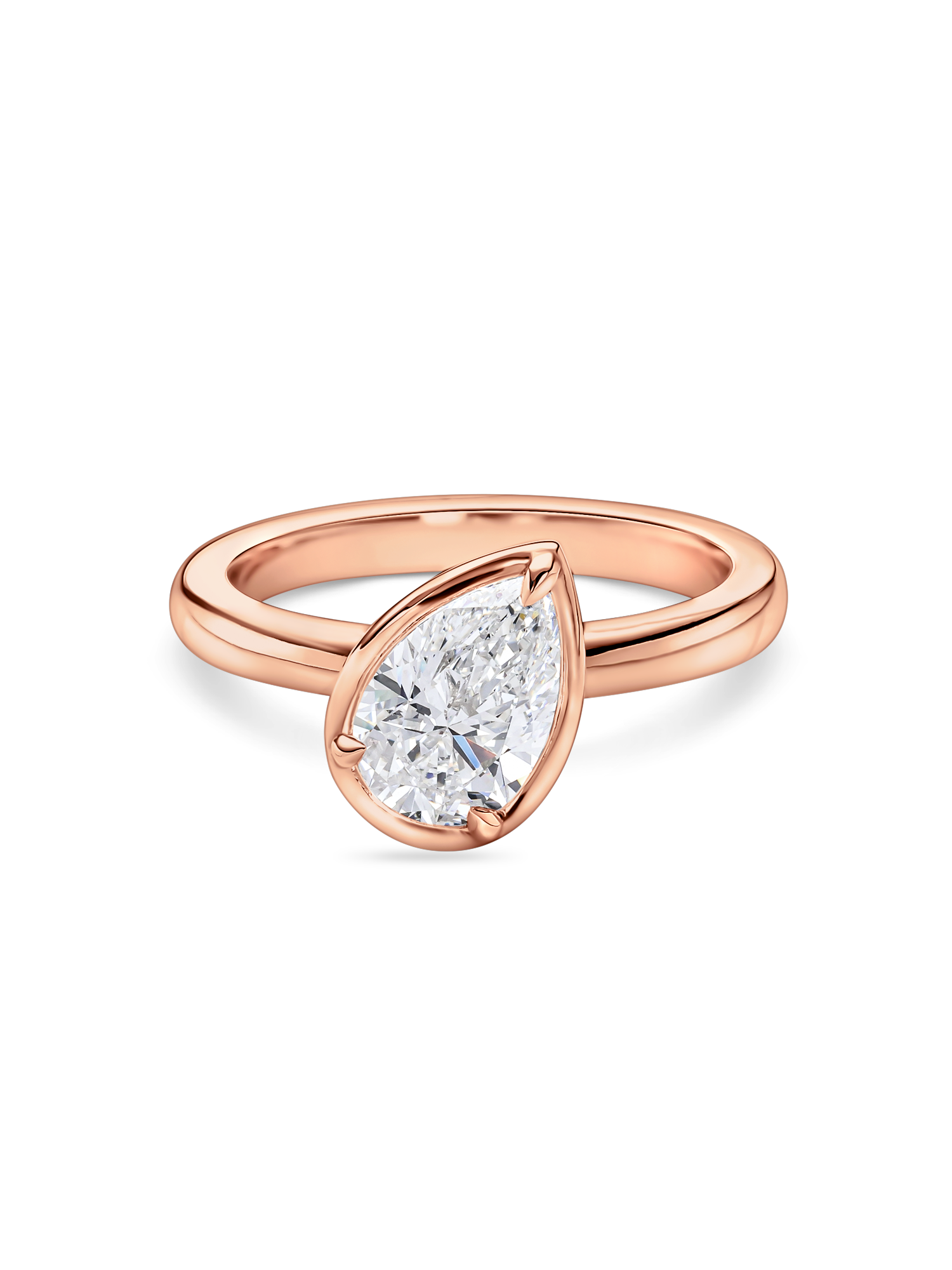 front view of the titled pear solitaire engagement ring in rose gold, featuring a lab grown diamond. 