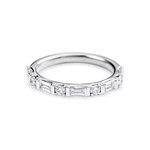 platinum round and baguette wedding ring made out of lab grown diamonds and recycled precious metals.