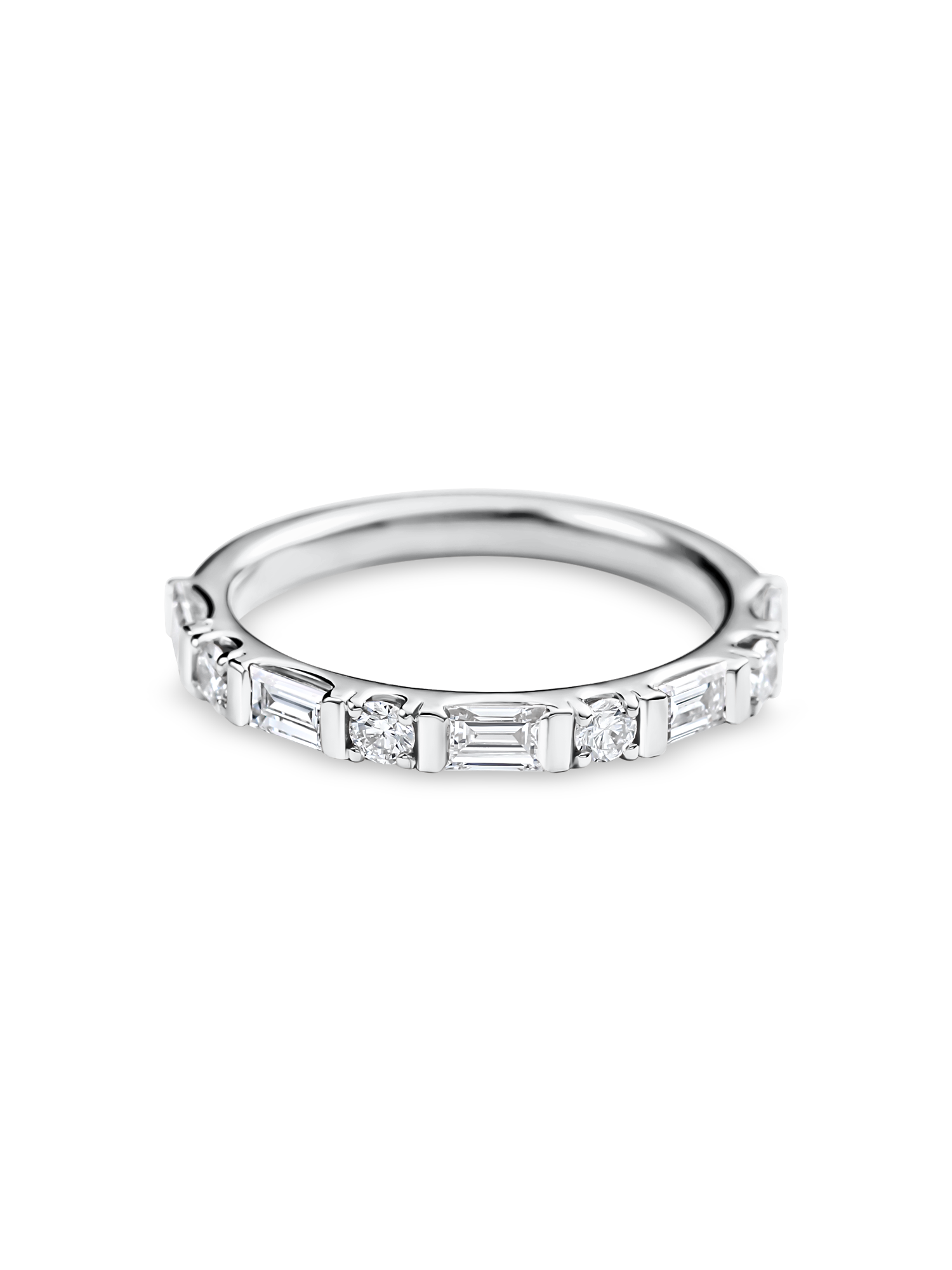 platinum round and baguette wedding ring made out of lab grown diamonds and recycled precious metals.