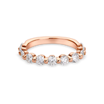 round shared claw wedding band with 3mm stones in rose gold