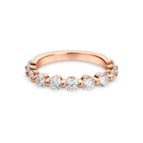 round shared claw wedding band with 3mm stones in rose gold