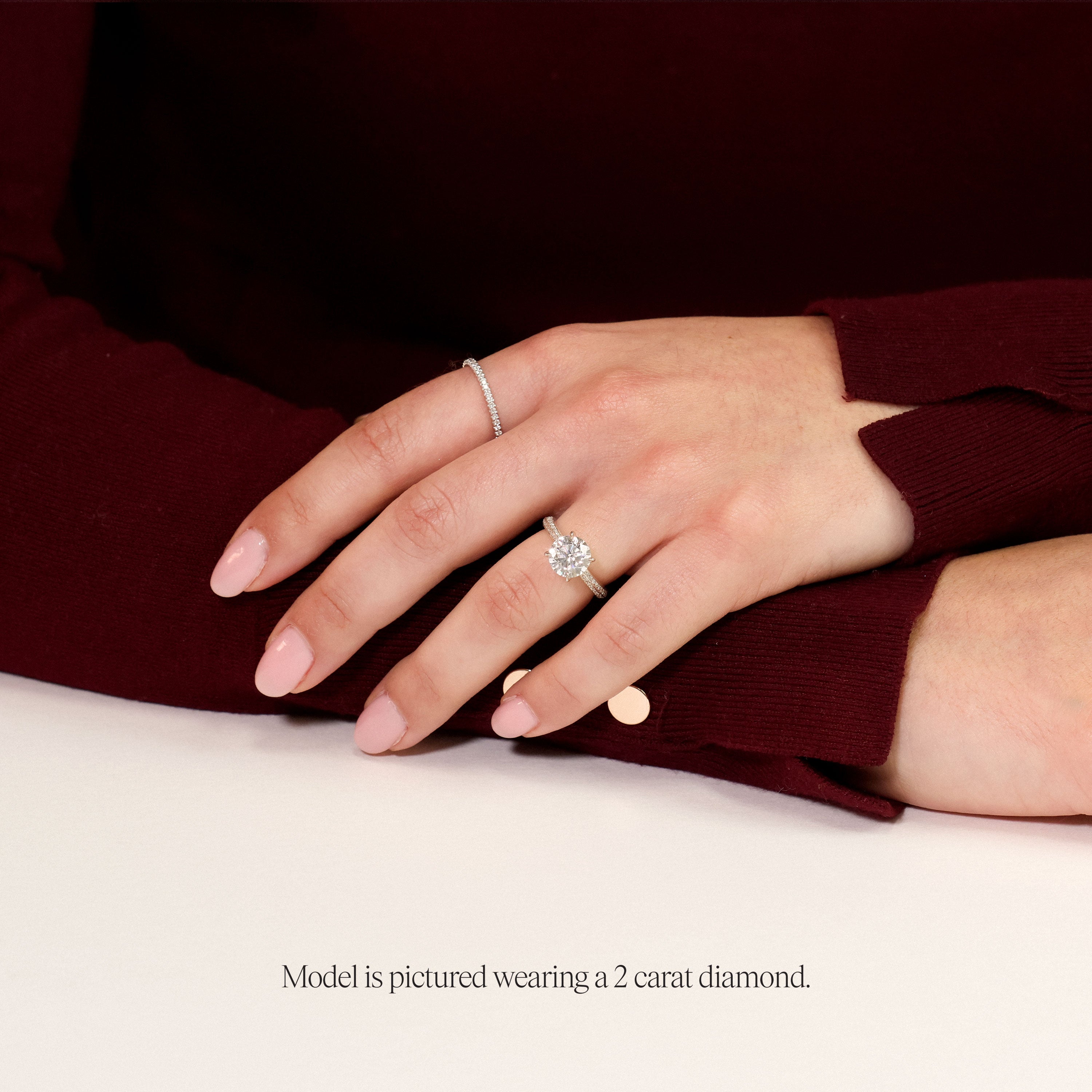 model 2 carat round solitaire with diamond set band. made from lab grown diamonds and recycled platinum