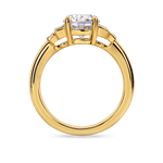 side view of yellow gold art deco engagement ring. Five stone ring with round lab grown diamonds and side baguettes