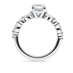 side view of unique platinum engagement ring featuring lab grown diamonds and a diamond set band. Made in london, uk