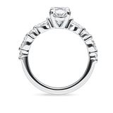 side view of unique platinum engagement ring featuring lab grown diamonds and a diamond set band. Made in london, uk