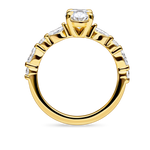 side view of unique yellow gold engagement ring featuring lab grown diamonds and a diamond set band. Made in london, uk