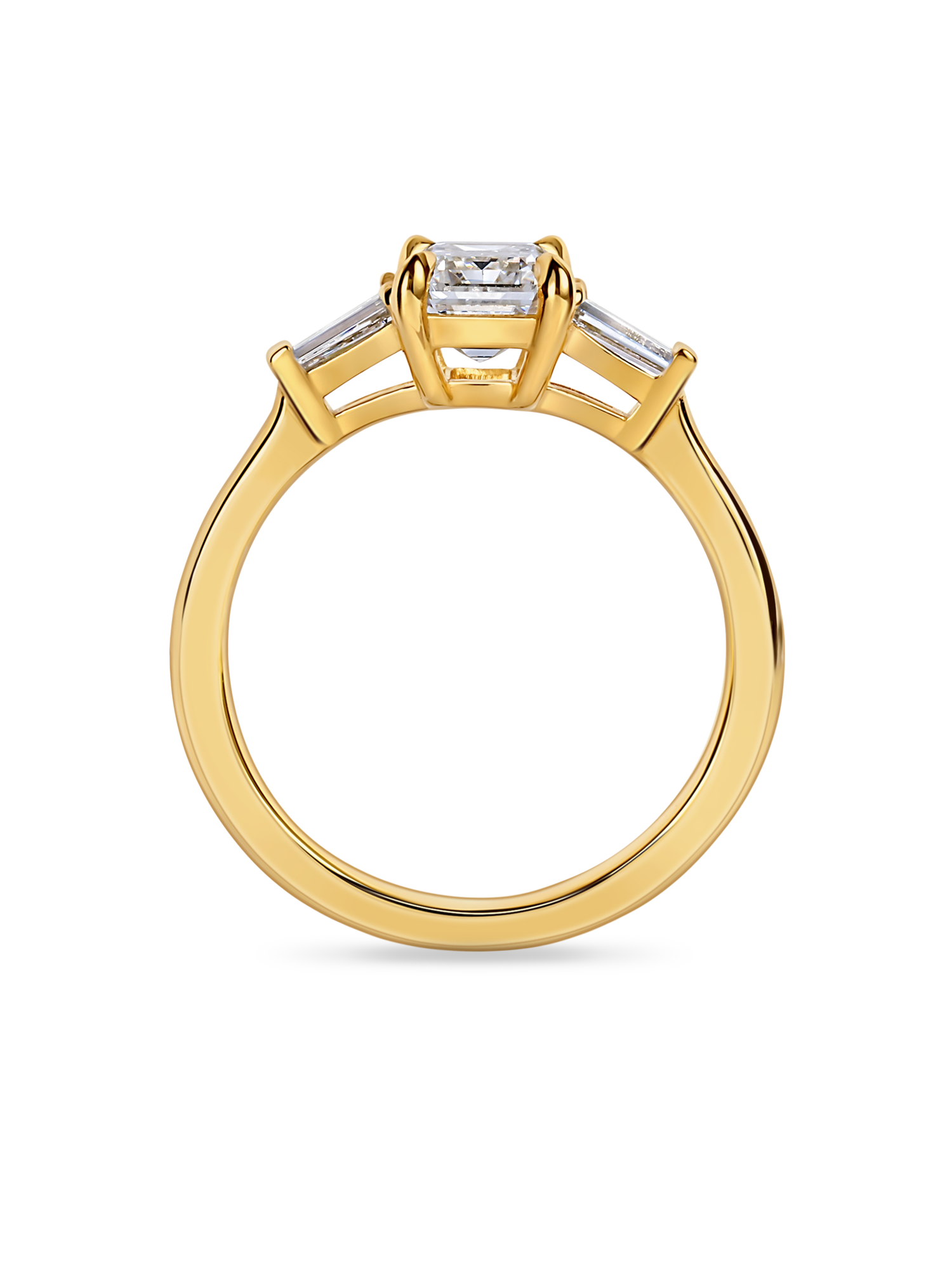 emerald cut trilogy engagement ring in yellow gold side view. features lab grown diamond