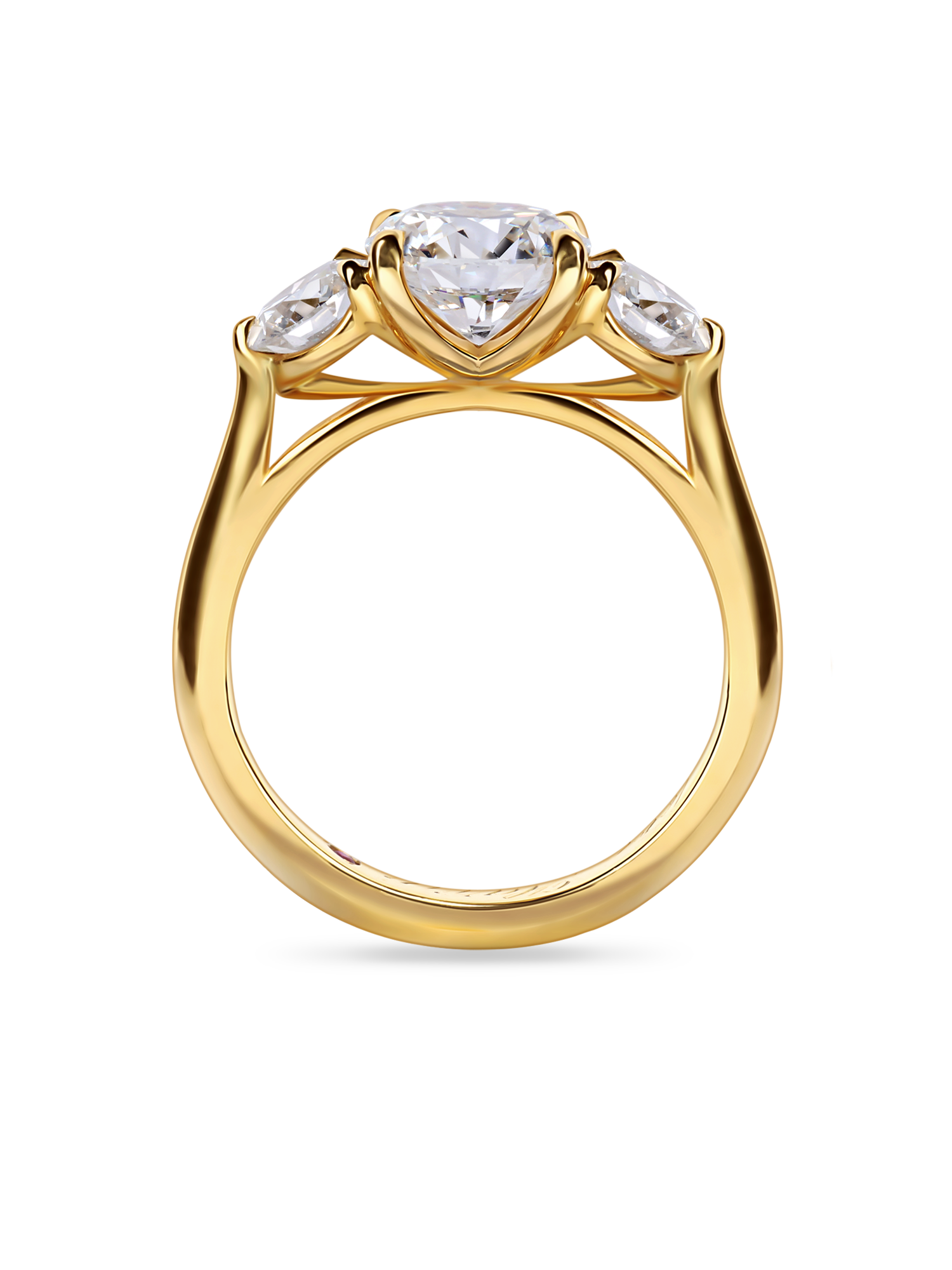 side on look at the round trilogy engagement ring featuring three lab grown round diamonds in yellow view
