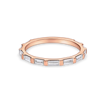 skinny baguette wedding band in rose gold. made with lab grown diamonds and recycled precious metals